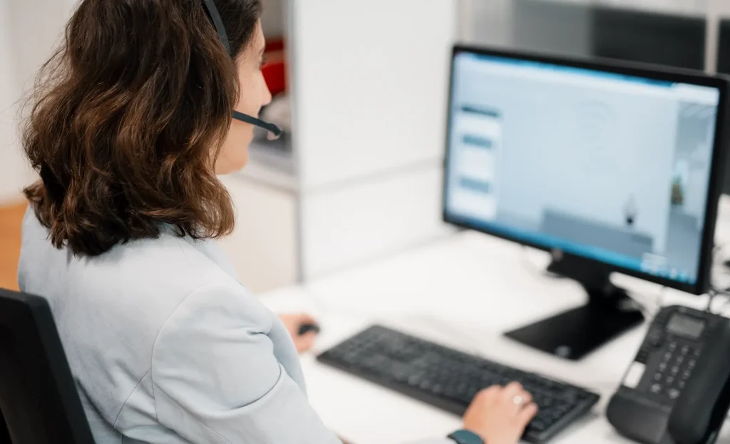 Person in call-center is taking a call