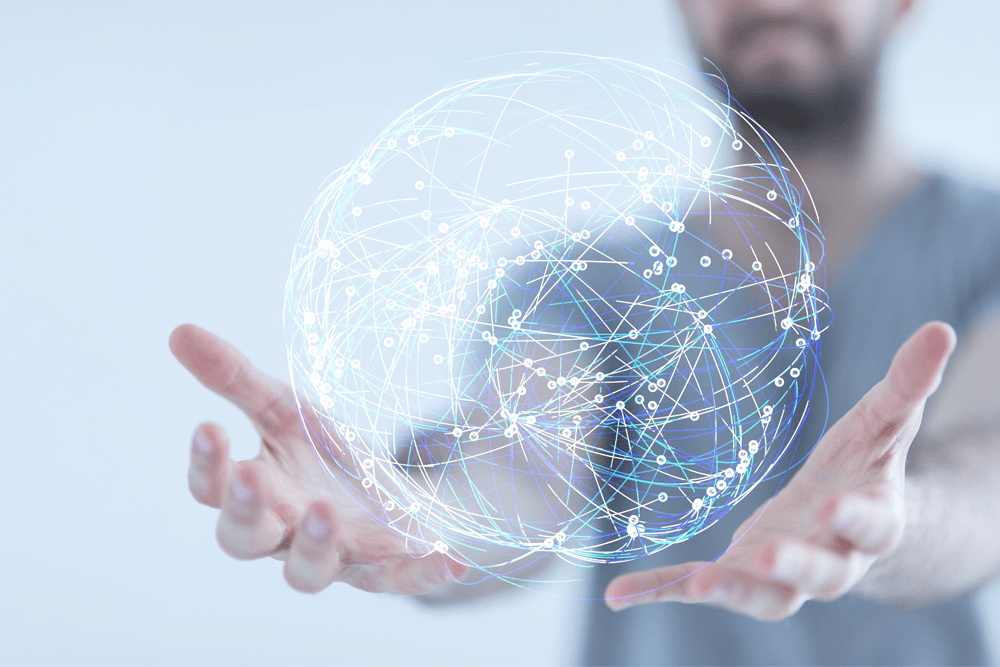 Man holding a ball of digital touchpoints in his hands